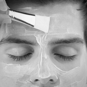 Male receiving chemical peel