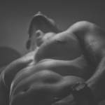 Close up of a male torso in greyscale